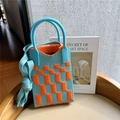 Detail of blue and orange checkered knit phone bag with matching top handle and strap - Blue & Orange Checkerboard