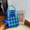 Detail of blue and green checkered knit mini tote bag with dual handles and shoulder strap - Blue & Cyan Argyle