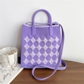 Close-up of purple knitted crossbody bag with diamond pattern and round handles - Purple Argyle