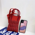 Detail of red knit phone bag with herringbone pattern and phone for size reference - Red & Wine Red Wheat Ear