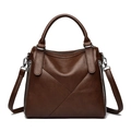 Deep coffee brown pebbled leather handbag with geometric X stitching and silver hardware - Brown