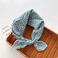 Detailed texture of cotton linen floral scarf with neat stitching in a woven basket - Starfish Floral Blue (21)