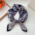 Elegant purple floral cotton linen square scarf tied in a stylish bow on white surface - Windowsill Flower Purple