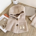 Close-up of beige knitted hooded scarf set featuring vertical ribs and brown marble buttons - Hooded Scarf and Sleeves Set (6 Buttons Solid Color Neck Hood Beige) / Beige