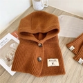 Detail of caramel brown knitted hooded neck warmer with vintage buttons on wood - Hooded Scarf (9 Buttons Solid Color Neck Hood Caramel) / Caramel color