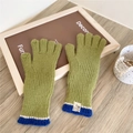 Close-up of green knitted gloves with blue striped cuffs and branded woven label detail - Grass Green