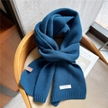 Minimalist solid blue 100% wool knitted scarf with ribbed edges and sewn-on wool label - Navy Blue