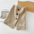 Detailed knit texture of beige neck warmer featuring brown buttons and woven label - 26*30cm / Off White