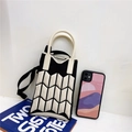 Mini borsa a tracolla in maglia per cellulare con motivi a onde nere e manico - Nero & Beige