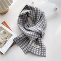 Chic grey and white houndstooth knit scarf with brand label for winter warmth - Gray