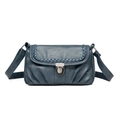 Navy blue soft leather crossbody bag with pleated details and woven trim design - Blue