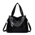 Borsa da donna in pelle martellata nera con logo canguro e ciondolo a foglia con perla - Nero