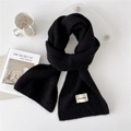 Solid black ribbed knit scarf with woven brand tag in a stylish winter flat lay - 22*165cm / Black