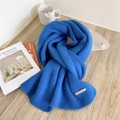 Thick Klein blue ribbed knit wool scarf for women with a metallic logo plate detail - Aqua