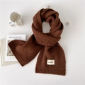 Deep brown knit scarf with vintage brand label and ribbed texture on white table - 22*165cm / Brown