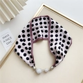 Detail of light pink polka dot silk scarf necklace with sparkling rhinestone magnetic balls - Pink with Black Polka Dots