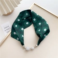 Detail of silk scarf featuring dark green floral prints and sparkling rhinestone magnetic clasps - Dark Green Vintage Floral