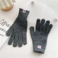 Detailed knit texture and ribbed cuff of dark gray acrylic winter touchscreen gloves - Gray