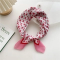 Pink floral cotton linen skinny scarf tied in a loop on a minimalist white desk - 58cm x 58cm / 16D Pink Small Floral