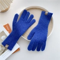 Detail of dark blue ribbed knit gloves with branded patch on a white tray - One Size / Blue