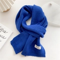 Detailed knit texture of solid deep blue wool scarf with a handmade fashion label - 22x180cm / Dark Blue