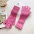 Detail of bright pink knit gloves showing the soft mohair texture and ribbed wrist cuffs - Pink