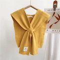 Close-up of yellow knitted cross shawl with vertical stripes and brand label - 35*90cm / Bright Yellow
