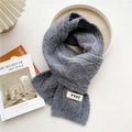 Gray cable-knit scarf for women with a vintage-style woven label and knitted texture - Gray