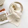 Cream white thick knit scarf with cable pattern and artistic YYDS patch detail - Cream