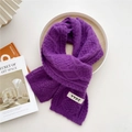 Deep purple cable knit scarf featuring a white YYDS label on soft acrylic winter fabric - Purple