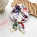 Elegant ivory floral silk scarf with purple orchids and pink lilies in a tied knot style - Spring Orchid Purple