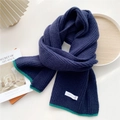 Dark blue knitted scarf with vibrant green border stitching and woven brand label - Navy Blue (Green Border)