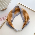 Macro detail of silk scarf necklace featuring magnetic rhinestone clasp and Greek key pattern - Ginger Grey Greek Key