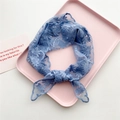 Elegant light blue lace headband with floral embroidery in a bow knot style - Sunflower Blue