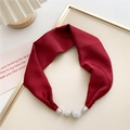 Detail of burgundy silk scarf featuring silver hardware and sparkling crystal beads - Burgundy