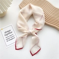 Beige thin silk scarf with delicate red grid lines, knotted style on elegant display - Beige Apricot