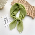 Grass green lightweight chiffon silk square scarf tied in an elegant knot style - Light Green