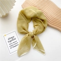 Mustard yellow square silk scarf with white stripes tied in a bow on a white tray - Lemon Yellow