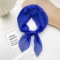 Elegant Klein Blue square silk scarf tied in a stylish knot on a minimalist display - Dark Blue