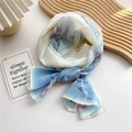 Light blue floral print lightweight chiffon scarf in a stylish circular knot styling - Magnolia