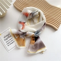 Elegant long silk scarf in cream white with orange and blue ink tree prints and gold trim - Yellow Red Mountain Forest