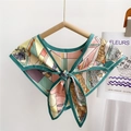 Colorful geometric floral print silk-like triangle scarf tied on a hanger - Colorful Geometric Rope Green
