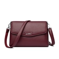 Minimalist burgundy litchi grain leather shoulder bag with silver logo and crossbody strap - Fuschia