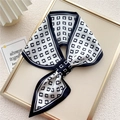 Elegant black and white silk scarf with geometric pattern tied as a chic necktie - Letter C Black & White (16F)