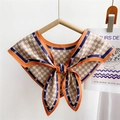 Vintage beige silk scarf with blue 'M' pattern and orange borders on wooden hanger - Letter M Monogram