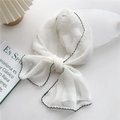 White chiffon skinny scarf with black wavy edges on a white table with books - White