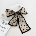 Vintage black sheer mesh bow hair tie with delicate floral pattern for elegant styling - Khaki Heart Clover
