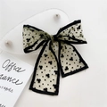 Light green sheer bow hair clip with black clover pattern and long elegant ribbons - Green Heart Clover