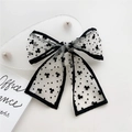 Narrow French silk scarf headband with black clover floral pattern on white mesh - White Heart Clover