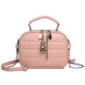 Pink quilted crossbody bag with silver bear charm and elegant chain strap detail - Pink